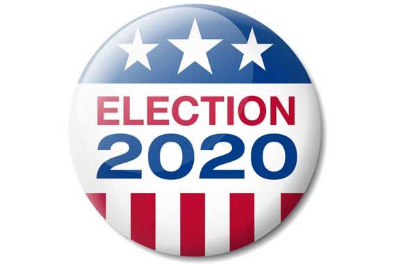 Un macaron aux couleurs du drapeau américain qui porte l'inscription Élection 2020.