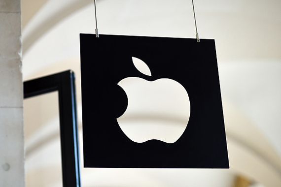 Une affiche sur laquelle est gravée la pomme d'Apple.