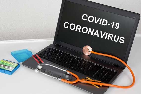 Un écran d'ordinateur qui montre COVID-19.